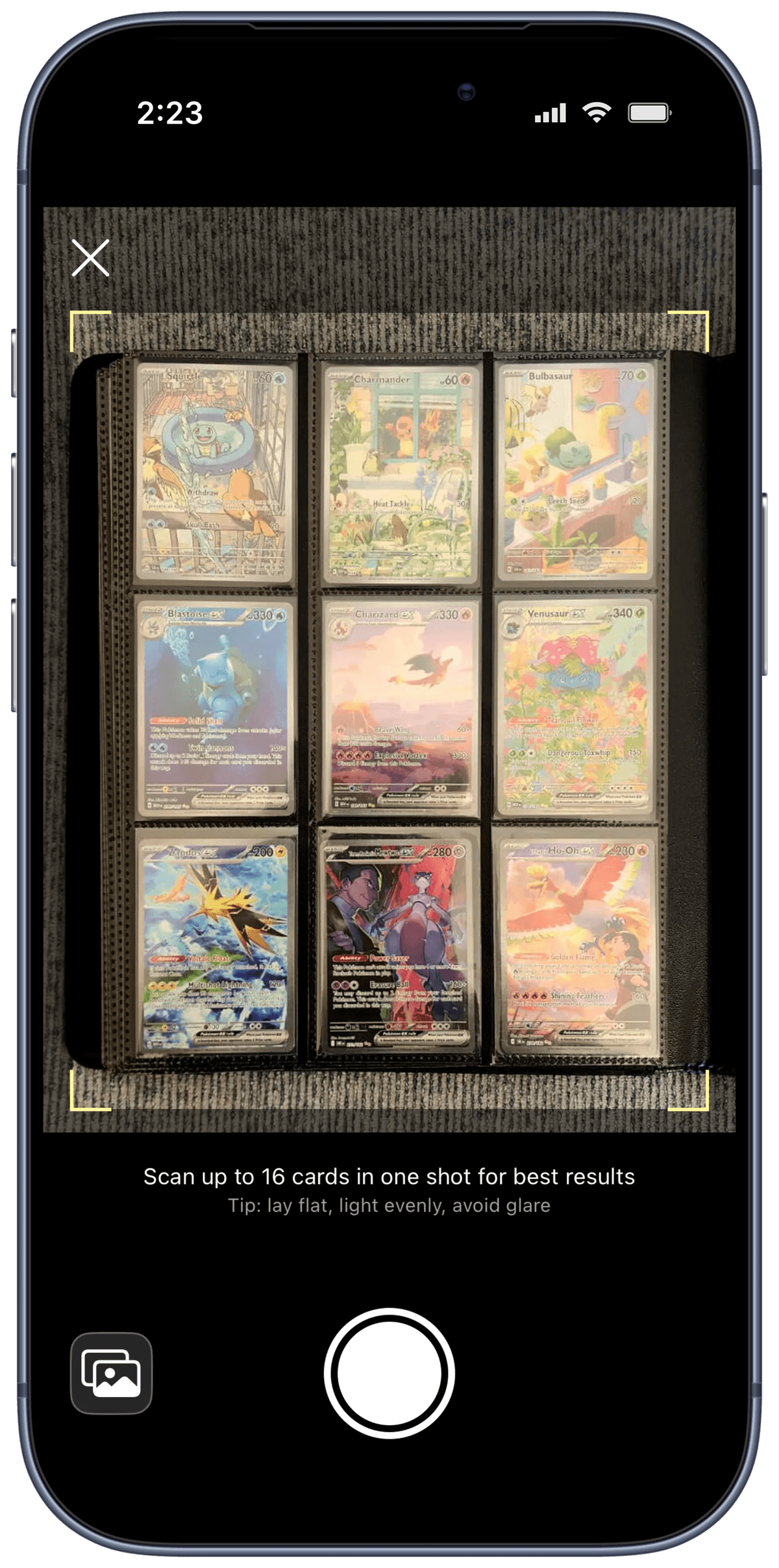 Rocketrader Scan view - camera aimed at a binder page of nine cards, ready to scan